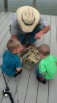 The kids learning about fishing.